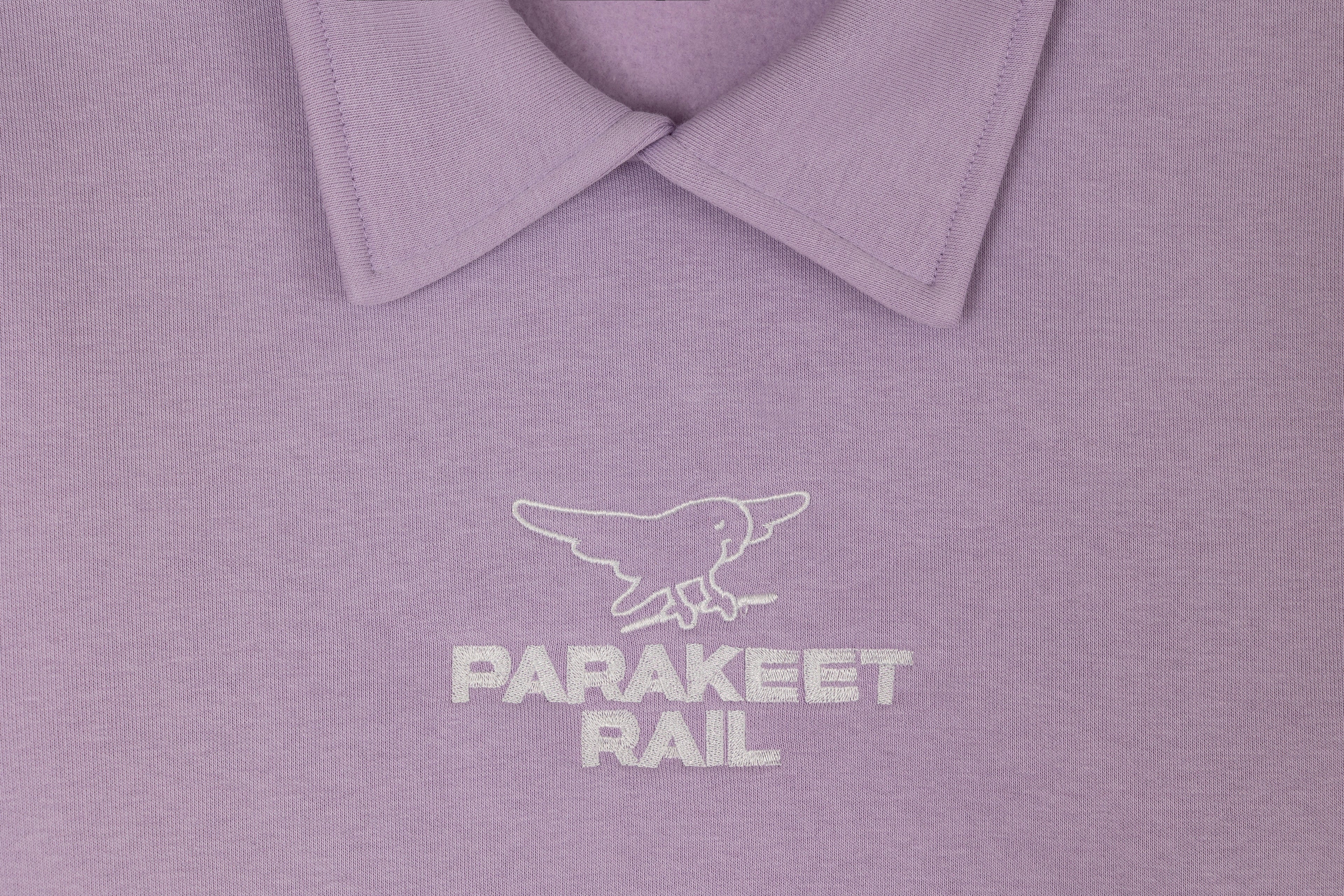 Parakeet Rail's pink crop top shown from the front.